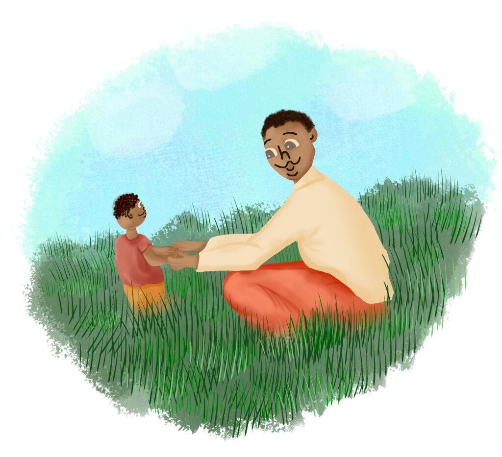 Dad and kid playing in the grass