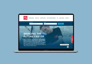 Image of laptop with home page of american axle website